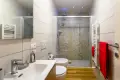 Modern bathroom with large chromotherapy shower