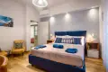 Bright blue bedroom ideal for a stay in Siena